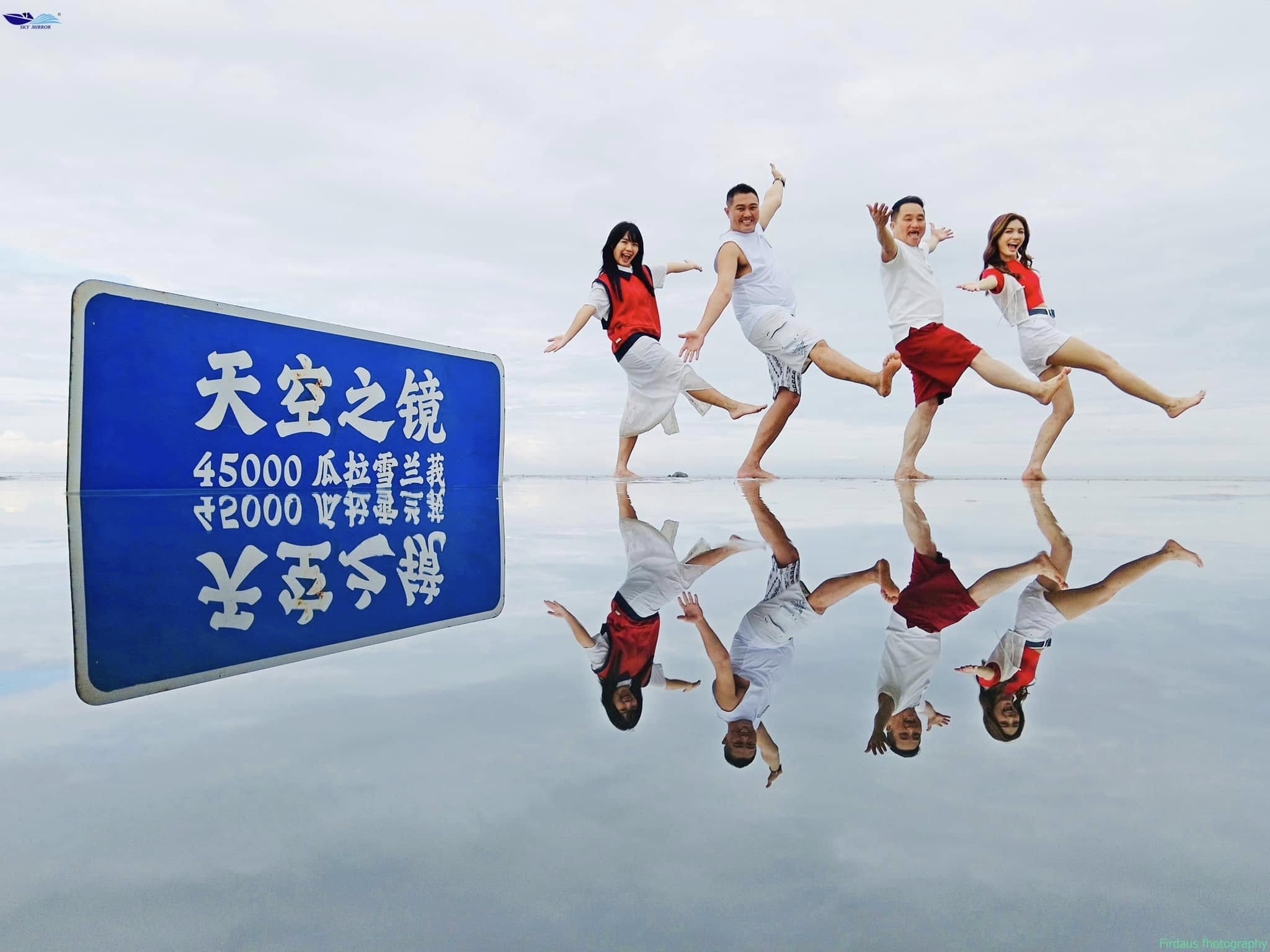 Travelers enjoying the photo opportunities at Sky Mirror.